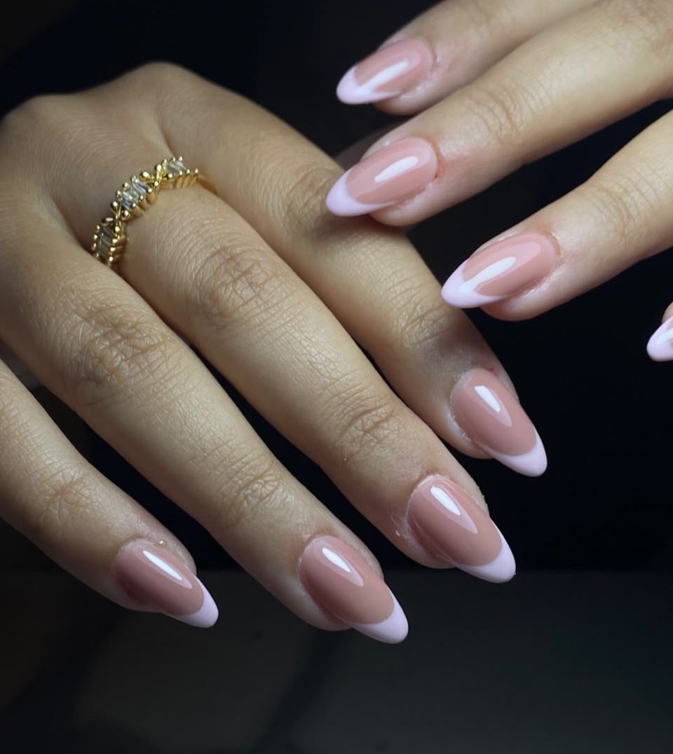 Glossy pink French-tip gel nails