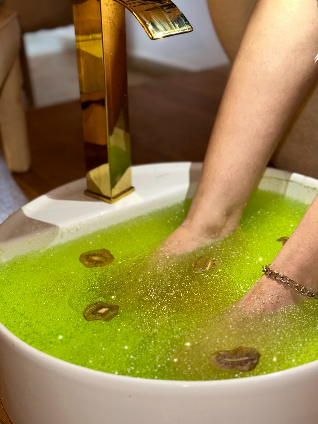 Pedicure foot bath with gold faucet at Glamour Nail